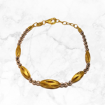 Gold Charm Bracelet with a Four-Leaf Clover