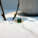 Emerald-Cut Green Stone and Diamond Ring